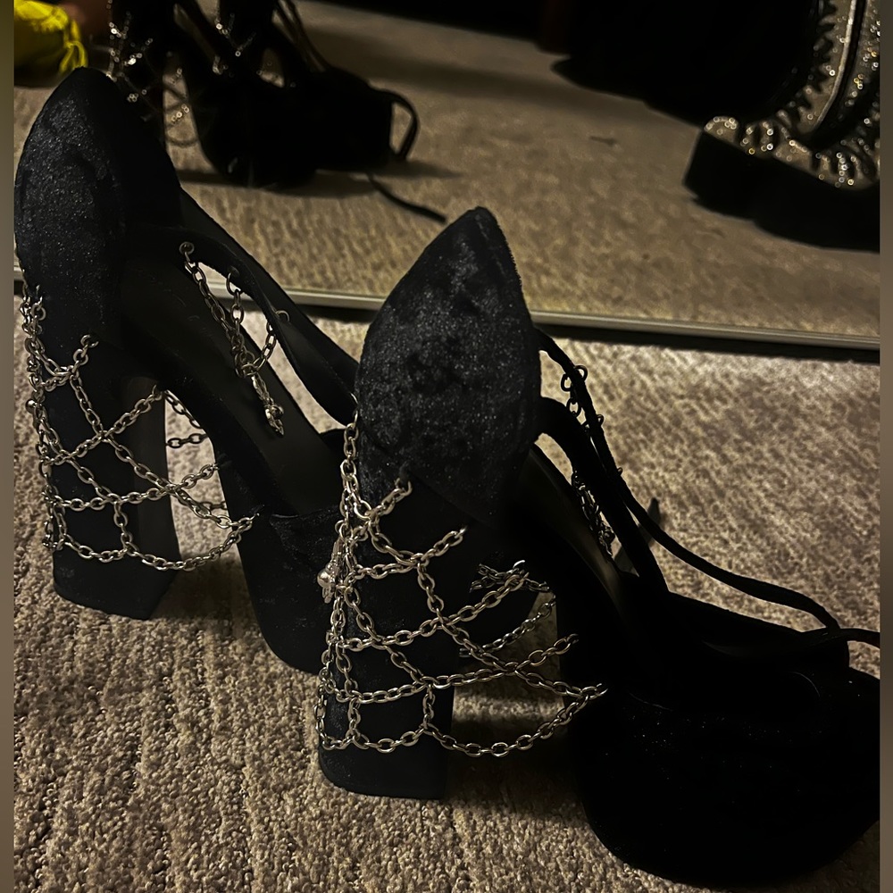 Limited edition black strap up wedge heals